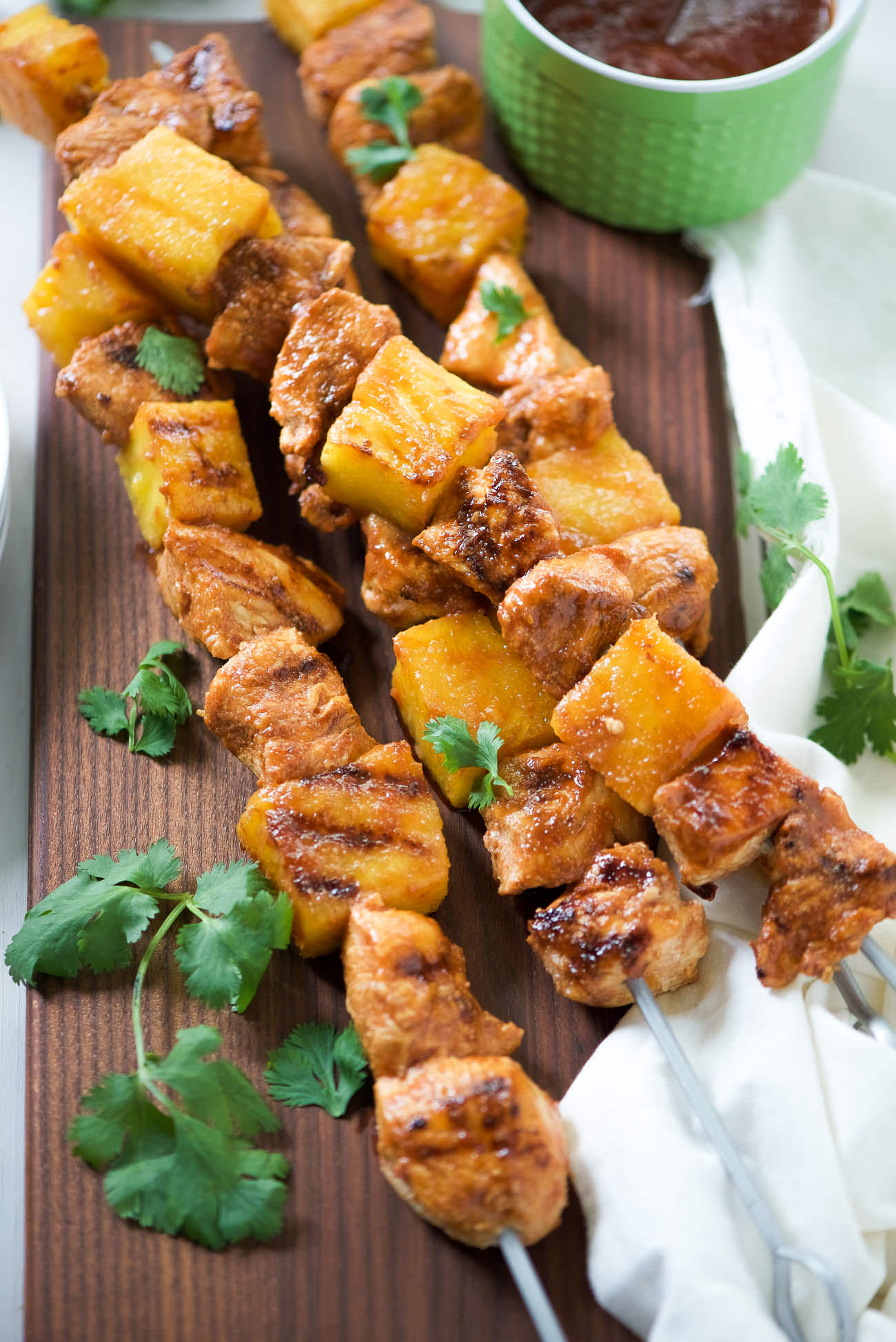 Grilled Huli Huli Chicken Kabobs - Juicy pineapple and tender chicken coated in a sweet and savory glaze then grilled to perfection! The perfect summertime, quick dinner!